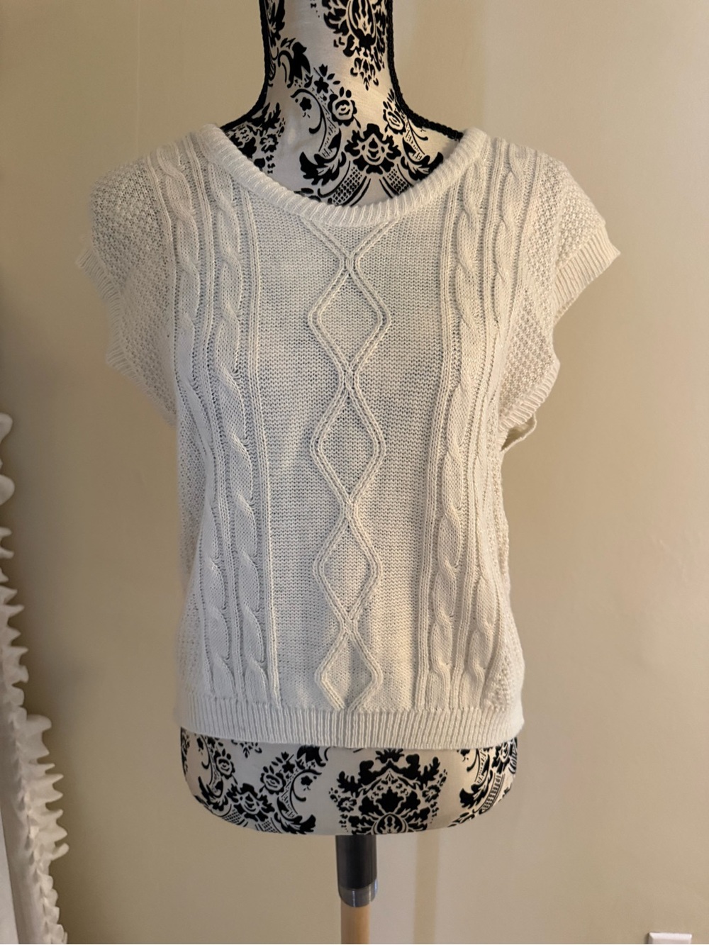 White sweater vest